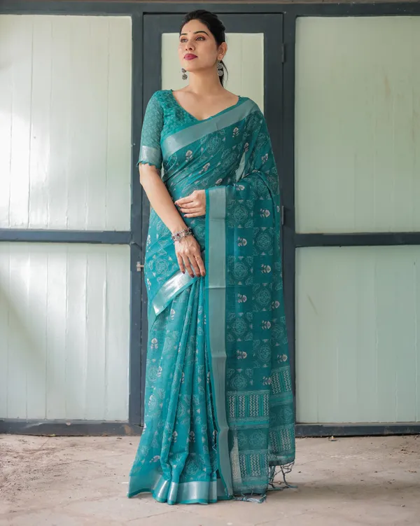 Teal_Green_Pure_Cotton_Linen_Saree_with_Silver_Floral_Motifs_and_Tassels