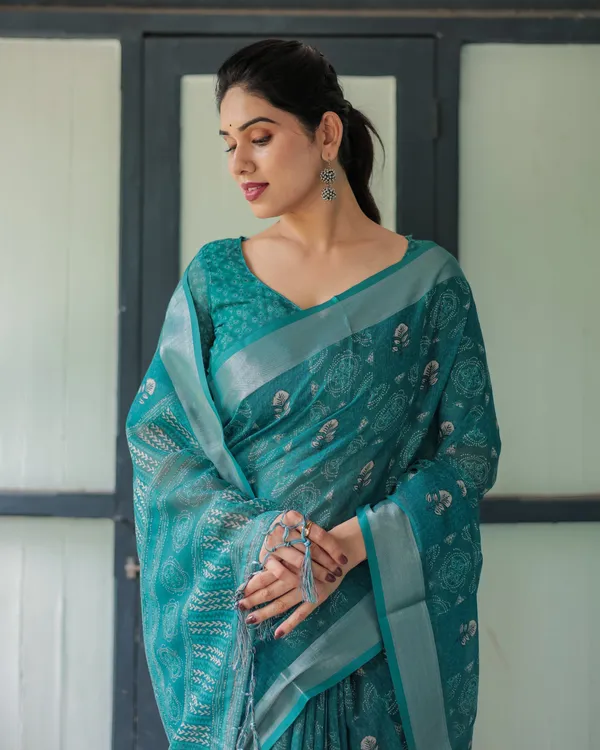 Teal_Green_Pure_Cotton_Linen_Saree_with_Silver_Floral_Motifs_and_Tassels