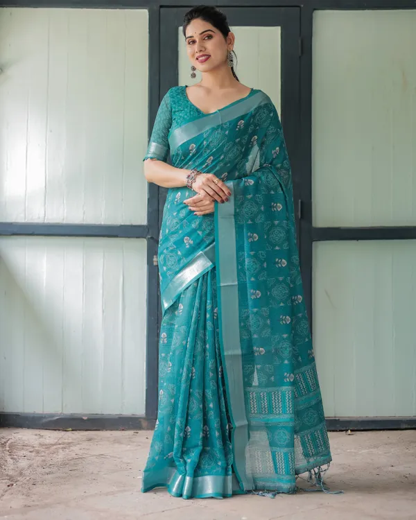 Teal_Green_Pure_Cotton_Linen_Saree_with_Silver_Floral_Motifs_and_Tassels