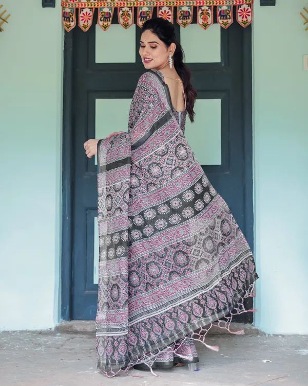 Black_Pure_Cotton_Linen_Saree_with_Pink_Striped_Pallu_and_Tassel_Accents