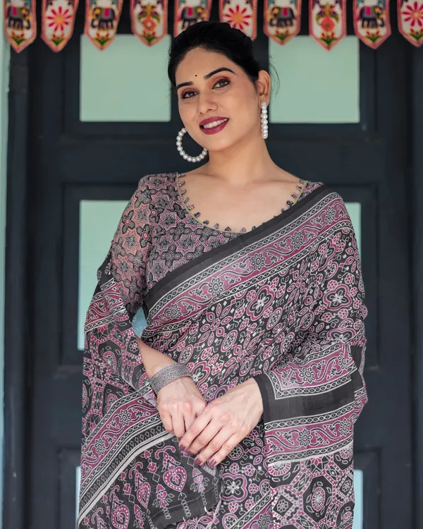 Black_Pure_Cotton_Linen_Saree_with_Pink_Striped_Pallu_and_Tassel_Accents