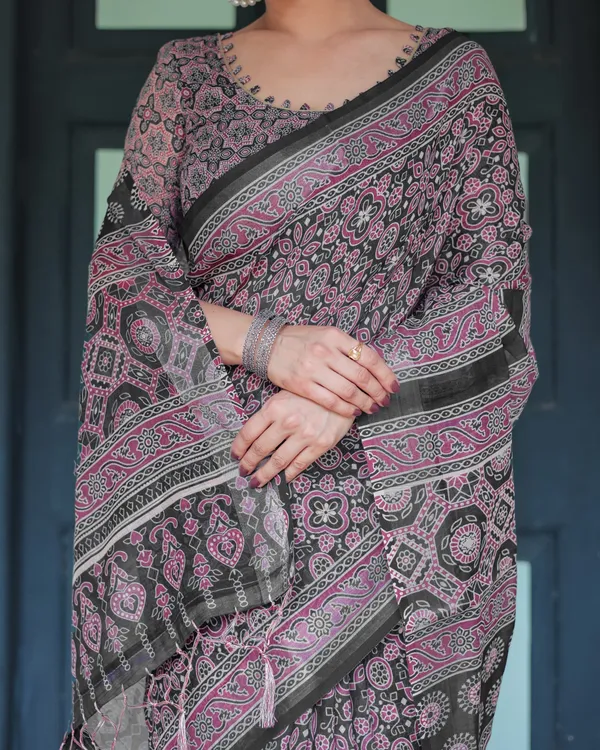 Black_Pure_Cotton_Linen_Saree_with_Pink_Striped_Pallu_and_Tassel_Accents