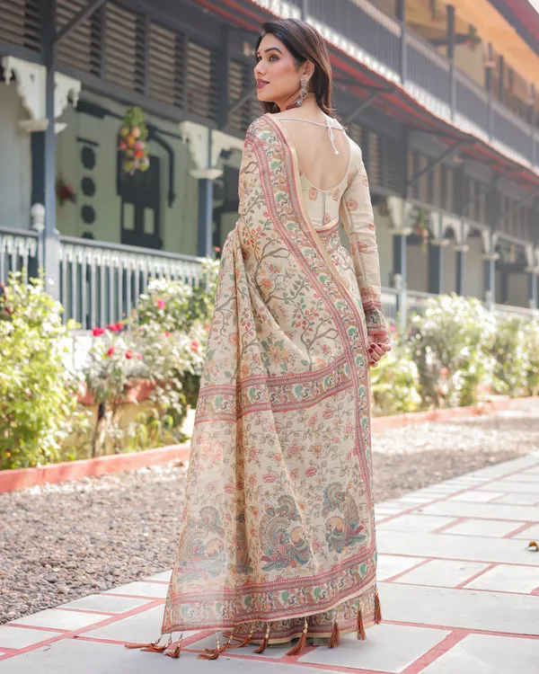 Ivory_Handloom_Cotton-Linen_Saree_with_Floral_and_Peacock_Motifs,_Zari_Highlights,_and_Tassel_Finish