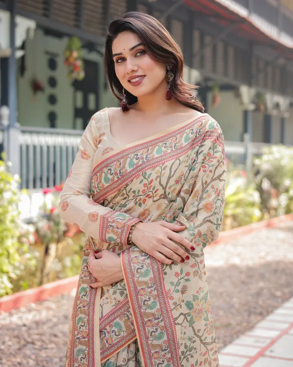 Ivory_Handloom_Cotton-Linen_Saree_with_Floral_and_Peacock_Motifs,_Zari_Highlights,_and_Tassel_Finish