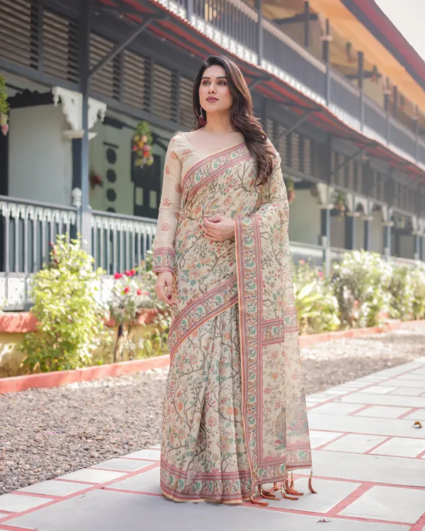 Ivory_Handloom_Cotton-Linen_Saree_with_Floral_and_Peacock_Motifs,_Zari_Highlights,_and_Tassel_Finish
