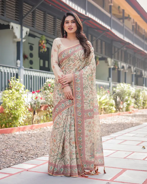 Ivory_Handloom_Cotton-Linen_Saree_with_Floral_and_Peacock_Motifs,_Zari_Highlights,_and_Tassel_Finish
