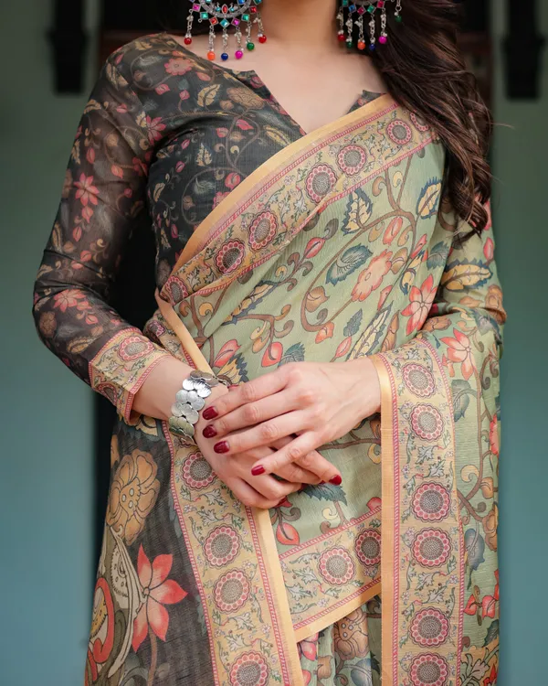 Sage_Green_with_Bold_Floral_Motifs_Linen_Cotton_Handloom_Printed_Saree,_Vibrant_Peacock_Pallu,_and_Tassels