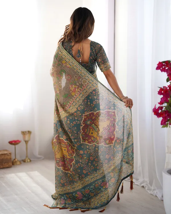 Teal_Green_Handloom_Cotton_Saree_with_Floral_Print_and_Royal_Elephant_Pallu