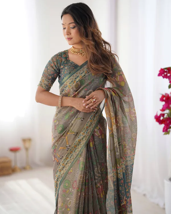 Teal_Green_Handloom_Cotton_Saree_with_Floral_Print_and_Royal_Elephant_Pallu