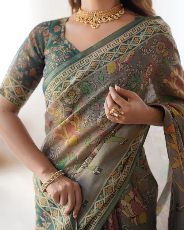 Teal_Green_Handloom_Cotton_Saree_with_Floral_Print_and_Royal_Elephant_Pallu