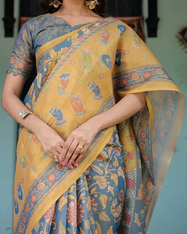 Mustard_Blue_Handloom_Cotton_Saree_with_Mudra_Motifs_&_Goddess_Saraswati_Pallu