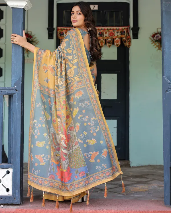 Mustard_Blue_Handloom_Cotton_Saree_with_Mudra_Motifs_&_Goddess_Saraswati_Pallu