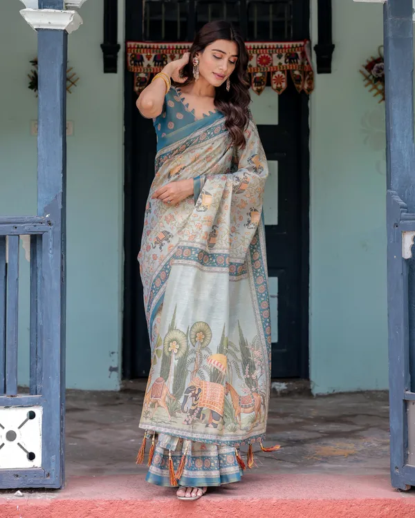 Icy_Blue_Handloom_Cotton_Saree_with_Peach_Elephant_Motifs_&_Royal_Procession_Pallu