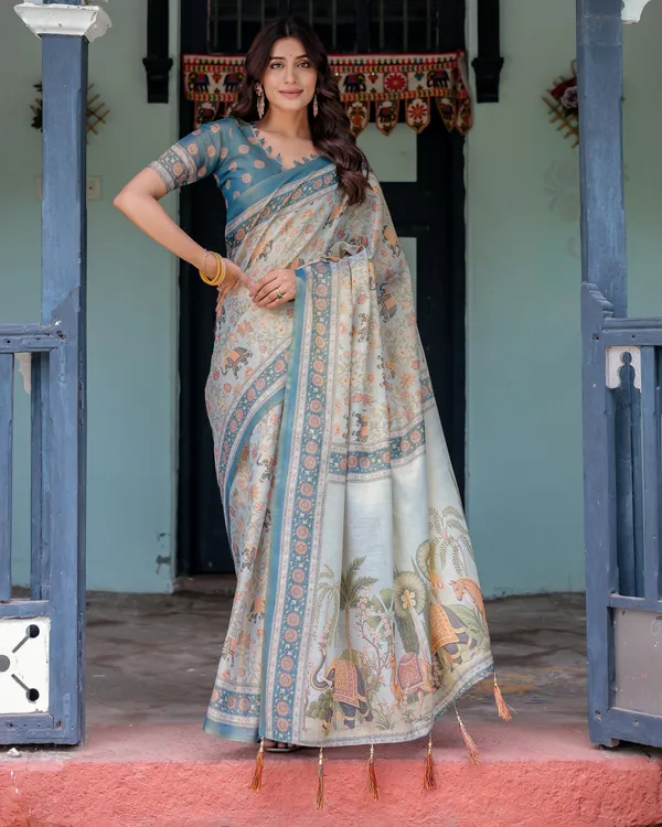 Icy_Blue_Handloom_Cotton_Saree_with_Peach_Elephant_Motifs_&_Royal_Procession_Pallu