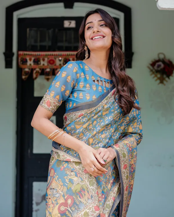 Divine_Blue_Handloom_Cotton_Saree_with_Shankh_&_Krishna_Pallu_Motifs_–_Temple_Border_&_Tassels