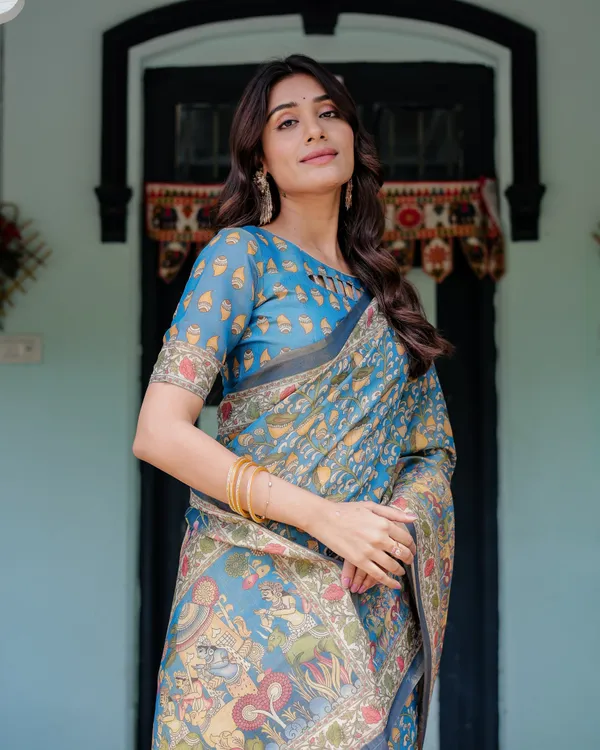 Divine_Blue_Handloom_Cotton_Saree_with_Shankh_&_Krishna_Pallu_Motifs_–_Temple_Border_&_Tassels