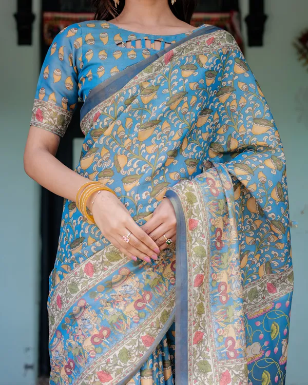Divine_Blue_Handloom_Cotton_Saree_with_Shankh_&_Krishna_Pallu_Motifs_–_Temple_Border_&_Tassels