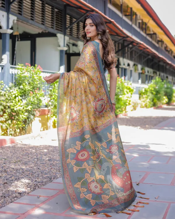 Yellow_Handloom_Cotton_Saree_with_Intricate_Peacock_&_Floral_Art_–_Contrast_Green_Pallu