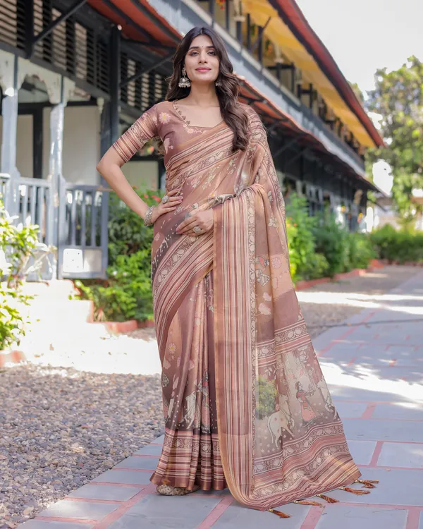 Divine_Brown_Handloom_Cotton_Saree_with_Radha_Krishna_&_Cow_Motif_–_Ethnic_Village_Charm