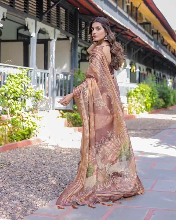 Divine_Brown_Handloom_Cotton_Saree_with_Radha_Krishna_&_Cow_Motif_–_Ethnic_Village_Charm