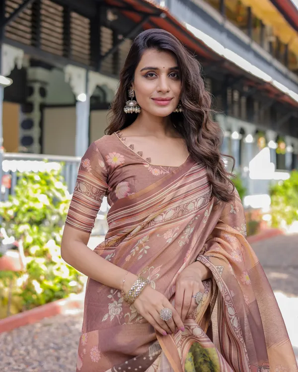 Divine_Brown_Handloom_Cotton_Saree_with_Radha_Krishna_&_Cow_Motif_–_Ethnic_Village_Charm
