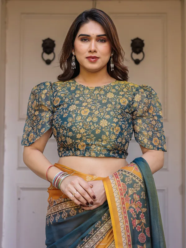 Mustard_Yellow_&_Teal_Green_Floral_Panel_Printed_Handloom_Cotton_Saree_with_Heritage_Border_&_Tassels_–_Festive_Traditional_Wear