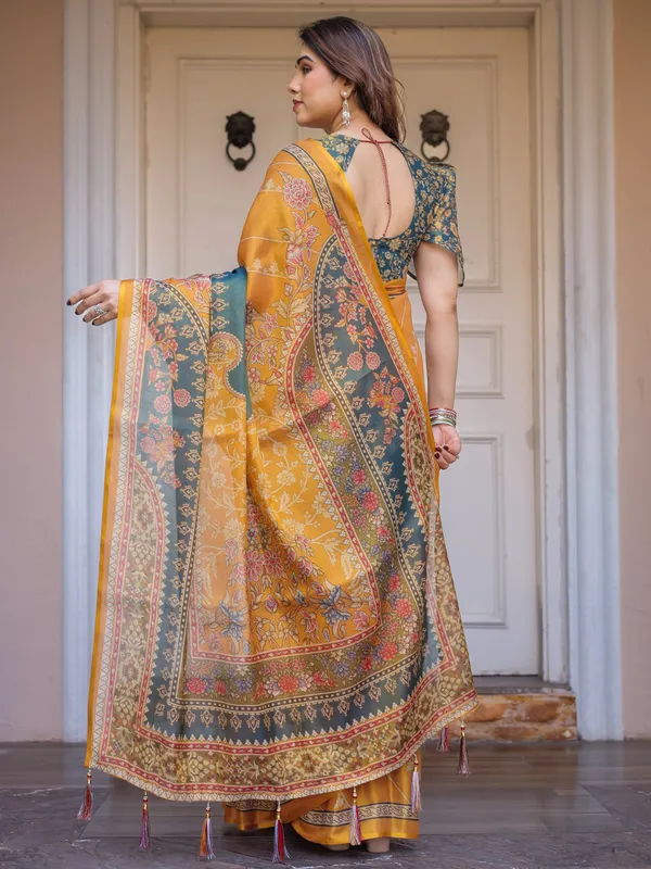 Mustard_Yellow_&_Teal_Green_Floral_Panel_Printed_Handloom_Cotton_Saree_with_Heritage_Border_&_Tassels_–_Festive_Traditional_Wear