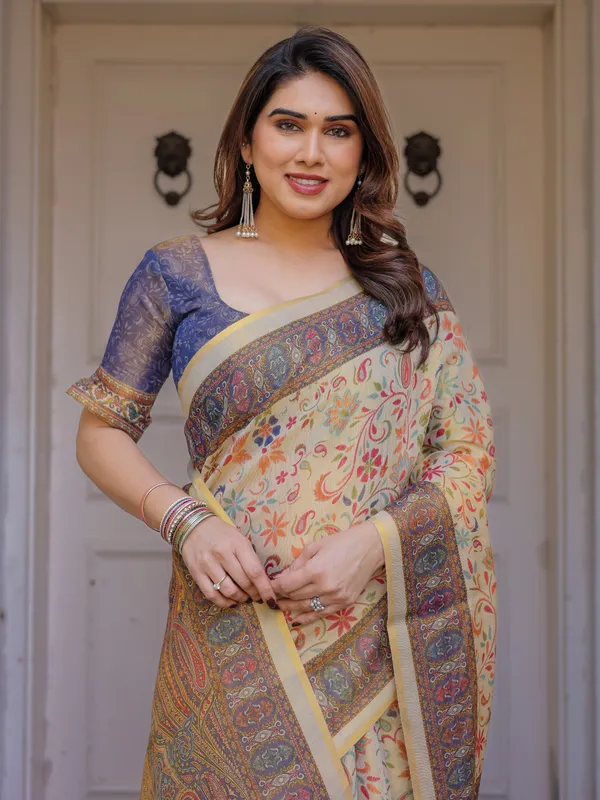 Cream_&_Navy_Blue_Floral_Paisley_Printed_Handloom_Cotton_Saree_with_Heritage_Border_&_Tassels_–_Festive_Ethnic_Wear