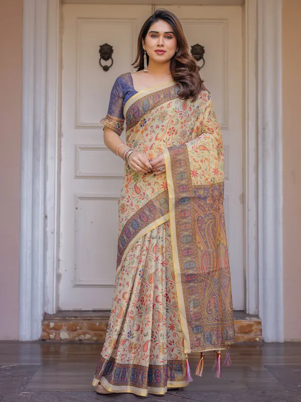 Cream_&_Navy_Blue_Floral_Paisley_Printed_Handloom_Cotton_Saree_with_Heritage_Border_&_Tassels_–_Festive_Ethnic_Wear