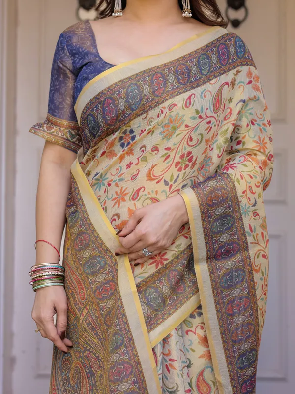 Cream_&_Navy_Blue_Floral_Paisley_Printed_Handloom_Cotton_Saree_with_Heritage_Border_&_Tassels_–_Festive_Ethnic_Wear