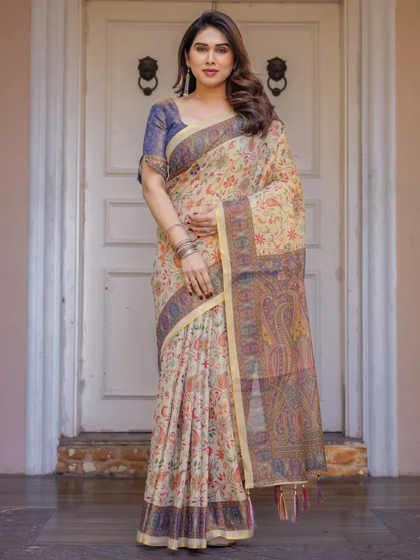Cream_&_Navy_Blue_Floral_Paisley_Printed_Handloom_Cotton_Saree_with_Heritage_Border_&_Tassels_–_Festive_Ethnic_Wear