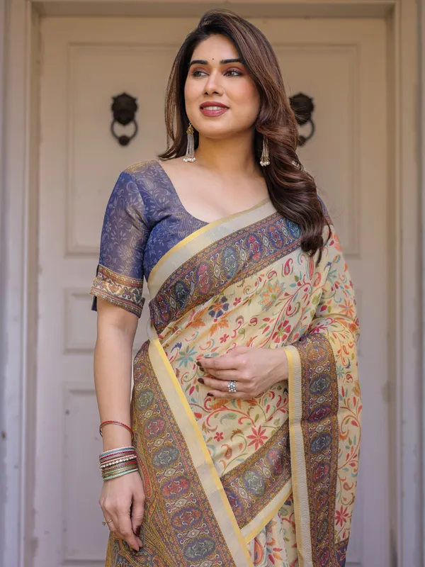 Cream_&_Navy_Blue_Floral_Paisley_Printed_Handloom_Cotton_Saree_with_Heritage_Border_&_Tassels_–_Festive_Ethnic_Wear