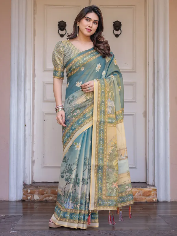 Pastel_Sea-Green_Scenic_Landscape_Printed_Handloom_Cotton_Saree_with_Artistic_Pallu_&_Tassels_–_Elegant_Day_Wear