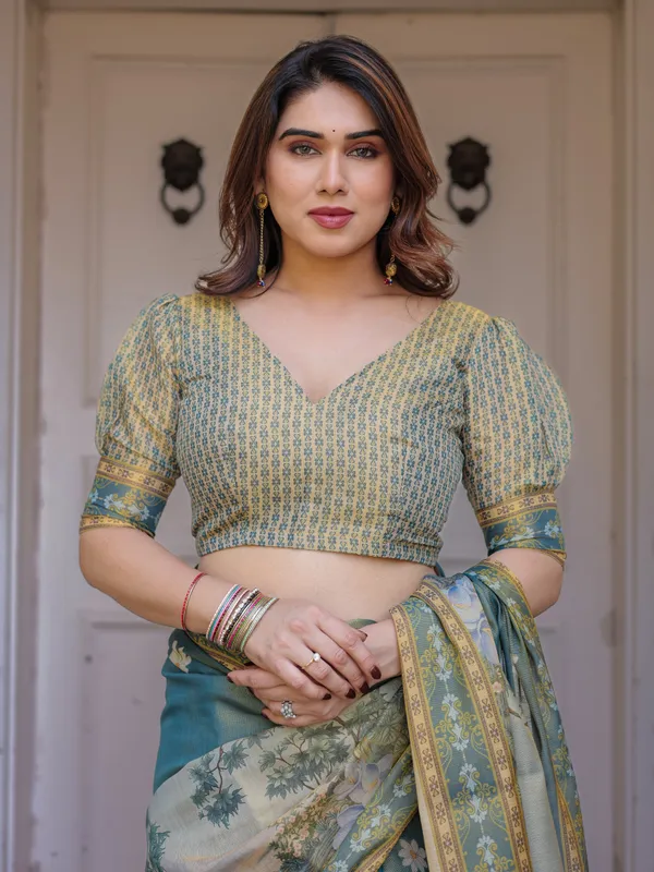 Pastel_Sea-Green_Scenic_Landscape_Printed_Handloom_Cotton_Saree_with_Artistic_Pallu_&_Tassels_–_Elegant_Day_Wear