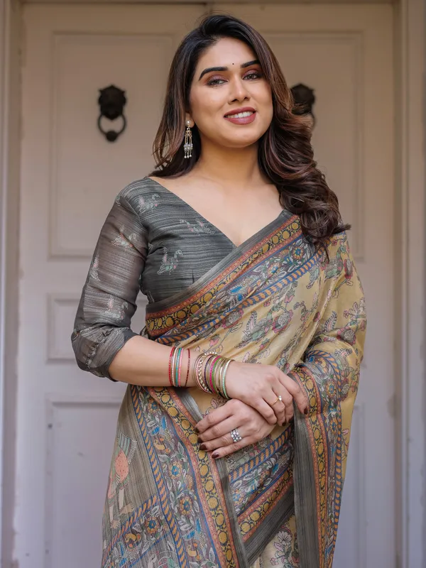 Beige_&_Olive_Green_Floral_Printed_Handloom_Cotton_Saree_with_Heritage_Panel_Pallu,_Ornamental_Border_&_Tassels_–_Elegant_Ethnic_Wear