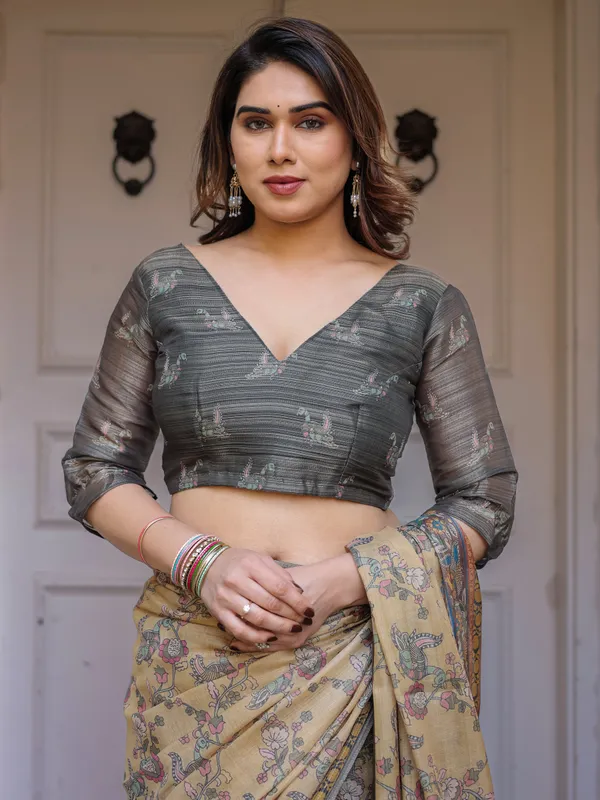 Beige_&_Olive_Green_Floral_Printed_Handloom_Cotton_Saree_with_Heritage_Panel_Pallu,_Ornamental_Border_&_Tassels_–_Elegant_Ethnic_Wear