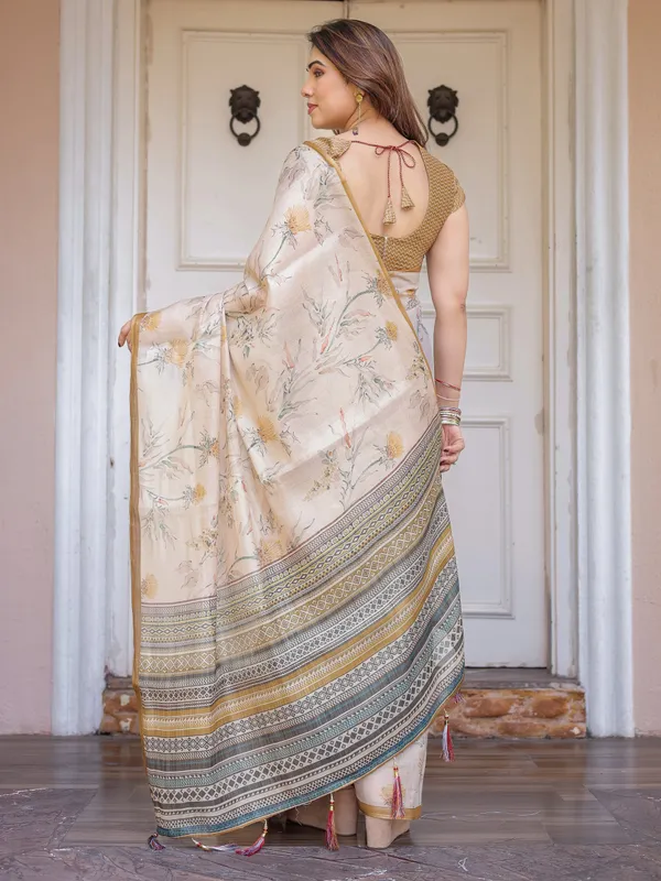 Beige_&_Mustard_Botanical_Handloom_Cotton-Linen_Saree_with_Ethnic_Striped_Pallu_&_Tassels_–_Graceful_Traditional_Wear