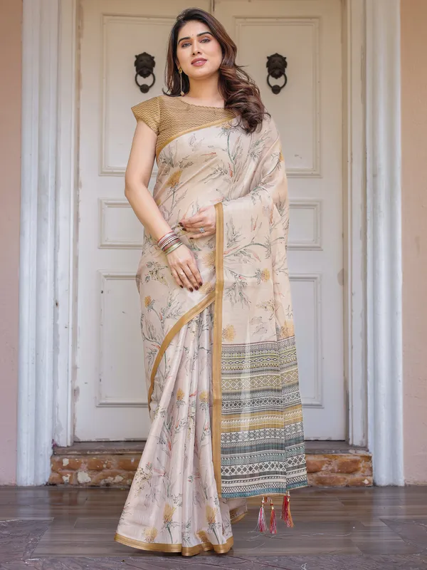 Beige_&_Mustard_Botanical_Handloom_Cotton-Linen_Saree_with_Ethnic_Striped_Pallu_&_Tassels_–_Graceful_Traditional_Wear