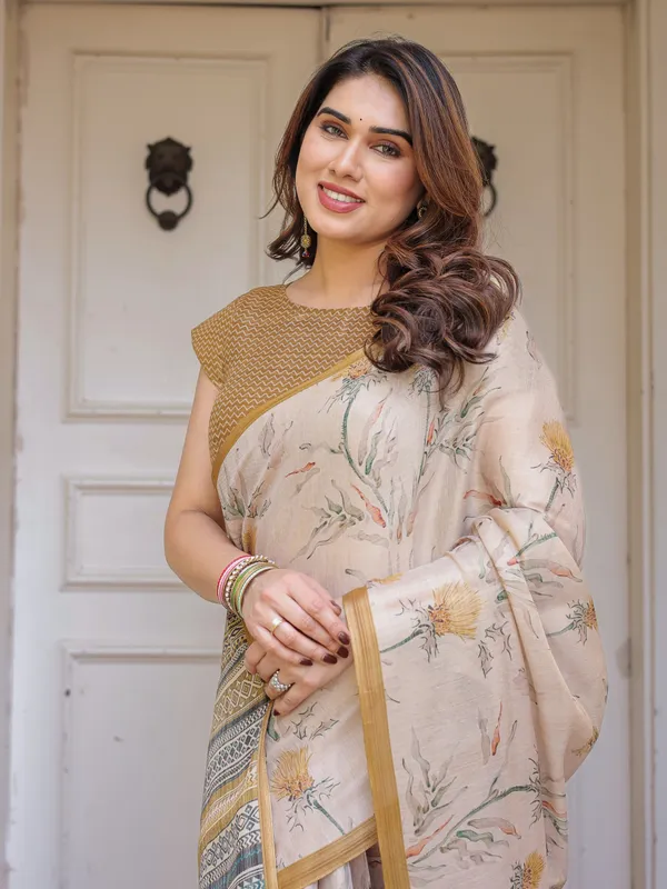 Beige_&_Mustard_Botanical_Handloom_Cotton-Linen_Saree_with_Ethnic_Striped_Pallu_&_Tassels_–_Graceful_Traditional_Wear