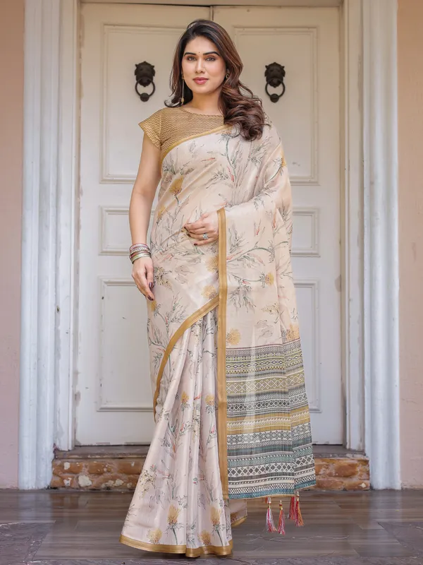 Beige_&_Mustard_Botanical_Handloom_Cotton-Linen_Saree_with_Ethnic_Striped_Pallu_&_Tassels_–_Graceful_Traditional_Wear