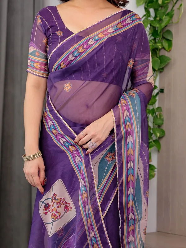 Royal_Purple_Printed_Organza_Saree_with_Multicolour_Ethnic_Border_&_Lace_Edges_|_Designer_Lightweight_Organza_Saree_with_Attached_Blouse_Piece_|_Festive_&_Party_Wear_Saree