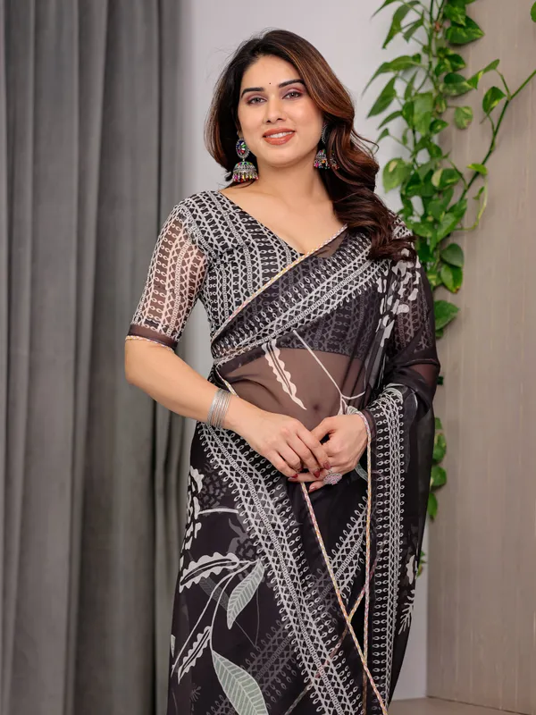 Elegant_Black_Floral_Printed_Organza_Saree_with_Intricate_Ethnic_Border_&_Multicolour_Lace_Edges_|_Lightweight_Designer_Organza_Saree_with_Attached_Blouse_Piece_|_Festive_&_Party_Wear_Saree