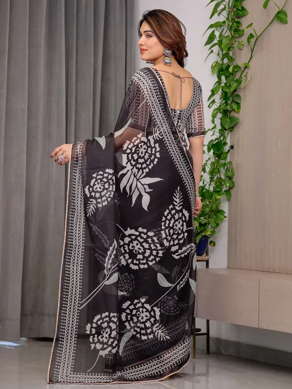 Elegant_Black_Floral_Printed_Organza_Saree_with_Intricate_Ethnic_Border_&_Multicolour_Lace_Edges_|_Lightweight_Designer_Organza_Saree_with_Attached_Blouse_Piece_|_Festive_&_Party_Wear_Saree