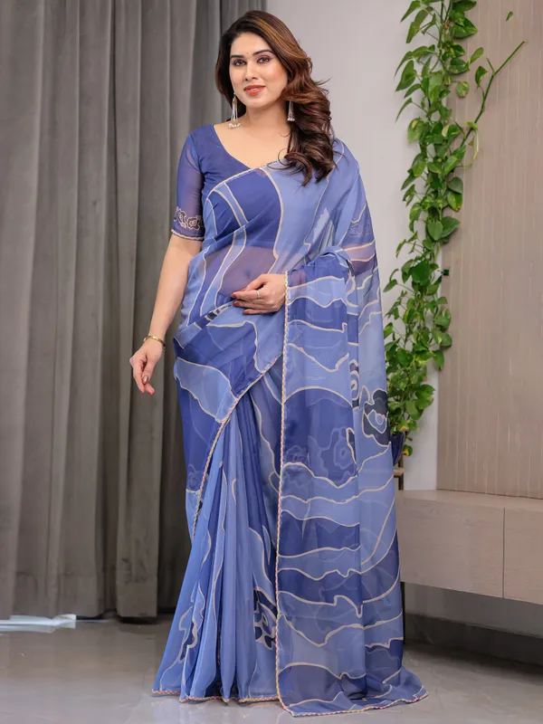 Elegant_Steel_Blue_Printed_Organza_Saree_with_Abstract_Wave_Motifs_&_Multicolour_Lace_Border_|_Designer_Lightweight_Organza_Saree_with_Attached_Blouse_Piece_|_Contemporary_Festive_Wear_Saree