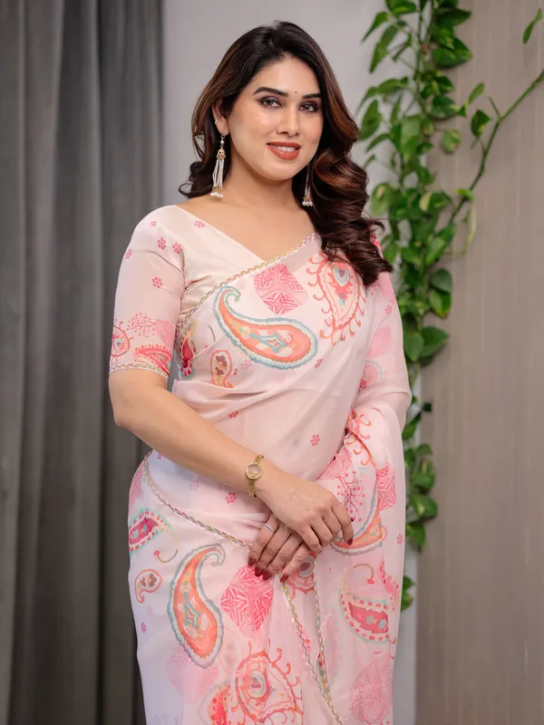 Pastel_Peach_Printed_Organza_Saree_with_Paisley_Motifs_&_Multicolour_Lace_Border_|_Designer_Lightweight_Organza_Saree_with_Attached_Blouse_Piece_|_Elegant_Festive_&_Party_Wear_Saree