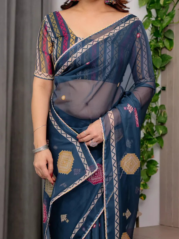Navy_Blue_Printed_Organza_Saree_with_Geometric_Motifs_&_Multicolour_Lace_Border_|_Designer_Lightweight_Organza_Saree_with_Attached_Blouse_Piece_|_Elegant_Festive_&_Party_Wear_Saree