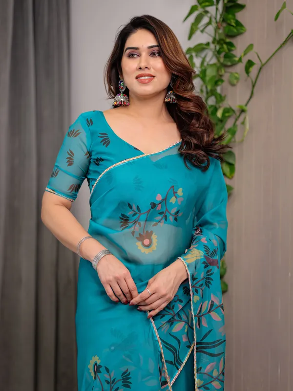 Teal_Green_Printed_Organza_Saree_with_Floral_&_Bird_Motifs_and_Multicolour_Lace_Border_|_Designer_Lightweight_Organza_Saree_with_Attached_Blouse_Piece_|_Elegant_Festive_&_Party_Wear_Saree