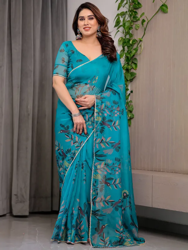 Teal_Green_Printed_Organza_Saree_with_Floral_&_Bird_Motifs_and_Multicolour_Lace_Border_|_Designer_Lightweight_Organza_Saree_with_Attached_Blouse_Piece_|_Elegant_Festive_&_Party_Wear_Saree