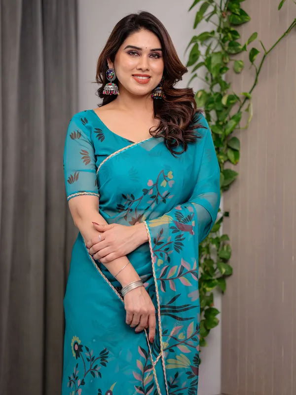 Teal_Green_Printed_Organza_Saree_with_Floral_&_Bird_Motifs_and_Multicolour_Lace_Border_|_Designer_Lightweight_Organza_Saree_with_Attached_Blouse_Piece_|_Elegant_Festive_&_Party_Wear_Saree