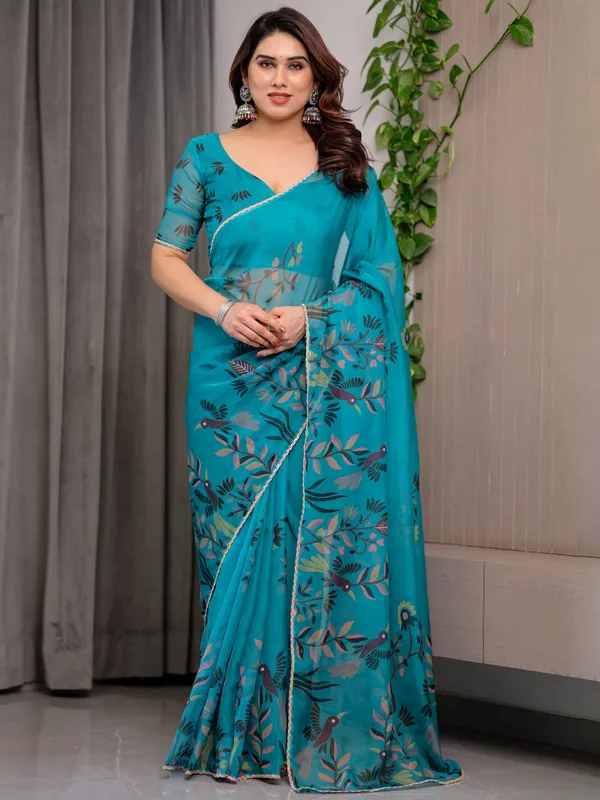 Teal_Green_Printed_Organza_Saree_with_Floral_&_Bird_Motifs_and_Multicolour_Lace_Border_|_Designer_Lightweight_Organza_Saree_with_Attached_Blouse_Piece_|_Elegant_Festive_&_Party_Wear_Saree